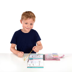 Melissa & Doug On the Go ruler on back cover helps with project references.
