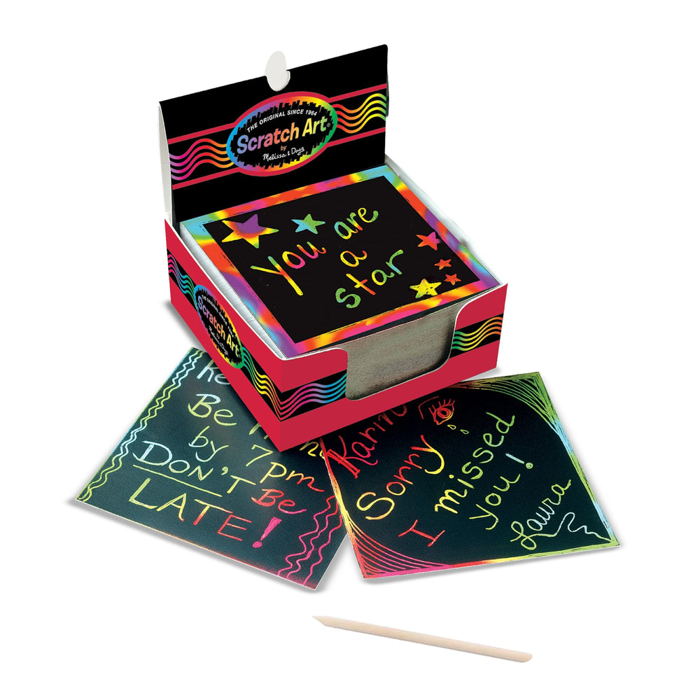 Melissa and Doug Scratch Art Rainbow Mini Notes with dispenser keeps desks tidy.