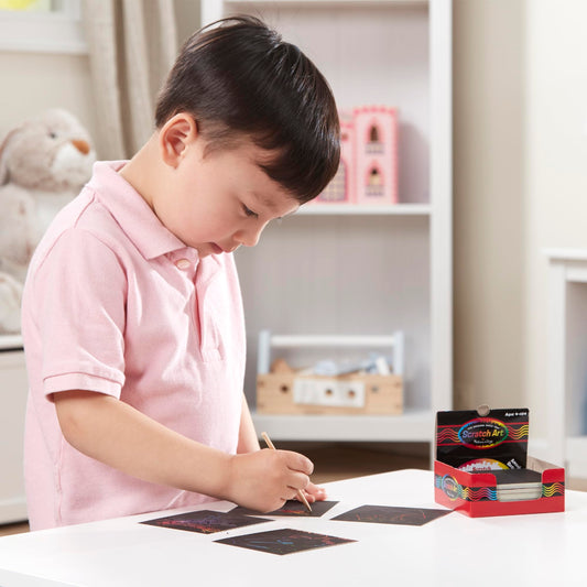 Wooden stylus reveals vibrant rainbow colors on each note for doodling.