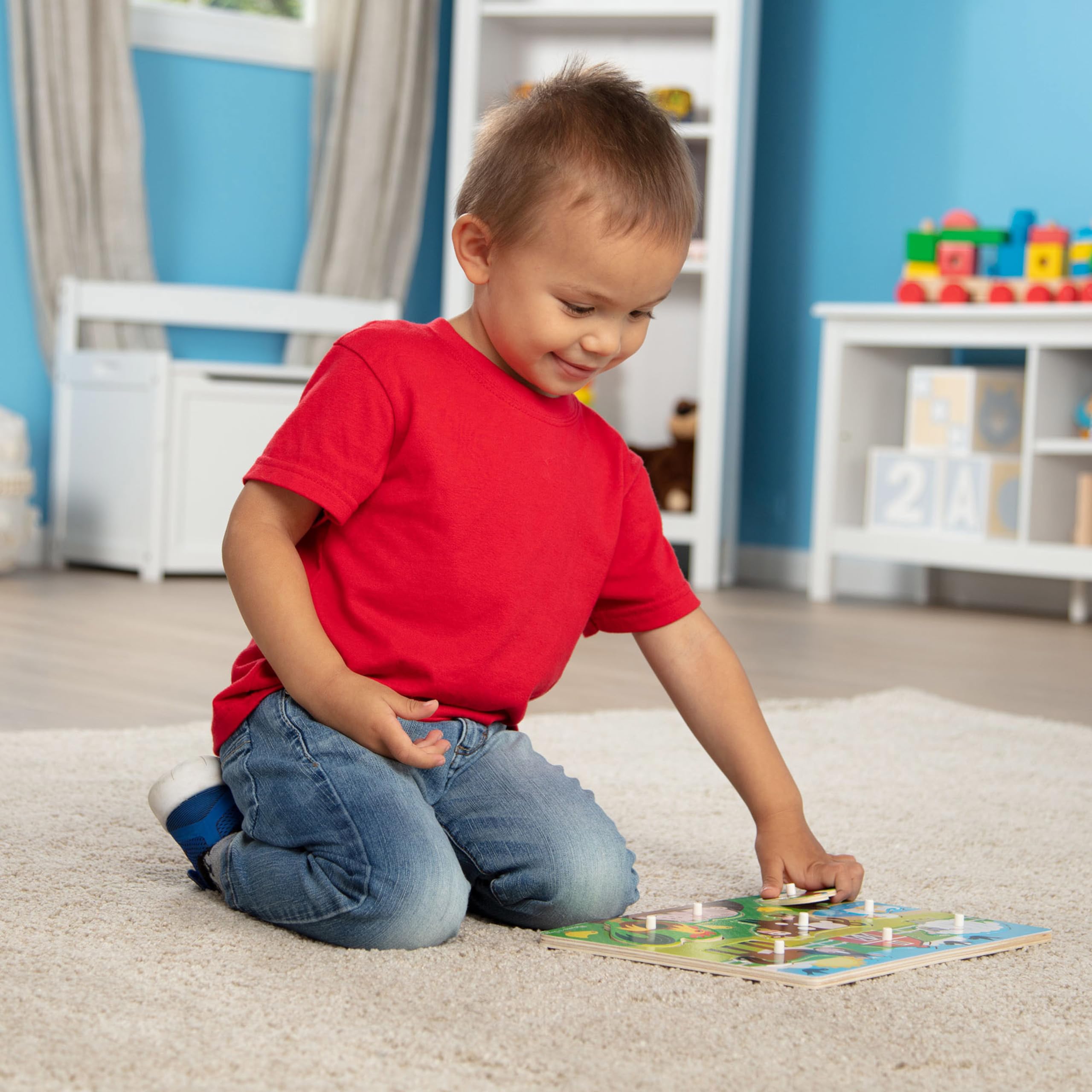 Melissa & Doug screen-free farm play set up on the floor or table.