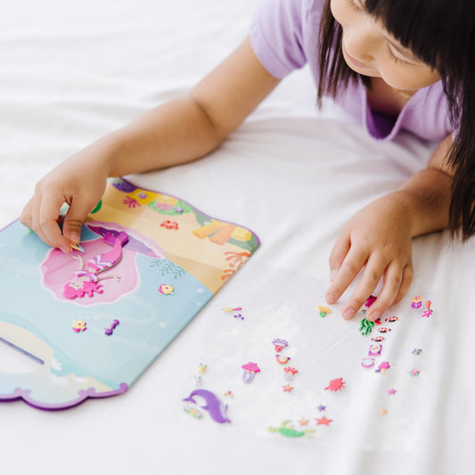 Melissa & Doug seashell closet outfits encourage dress-up storytelling.