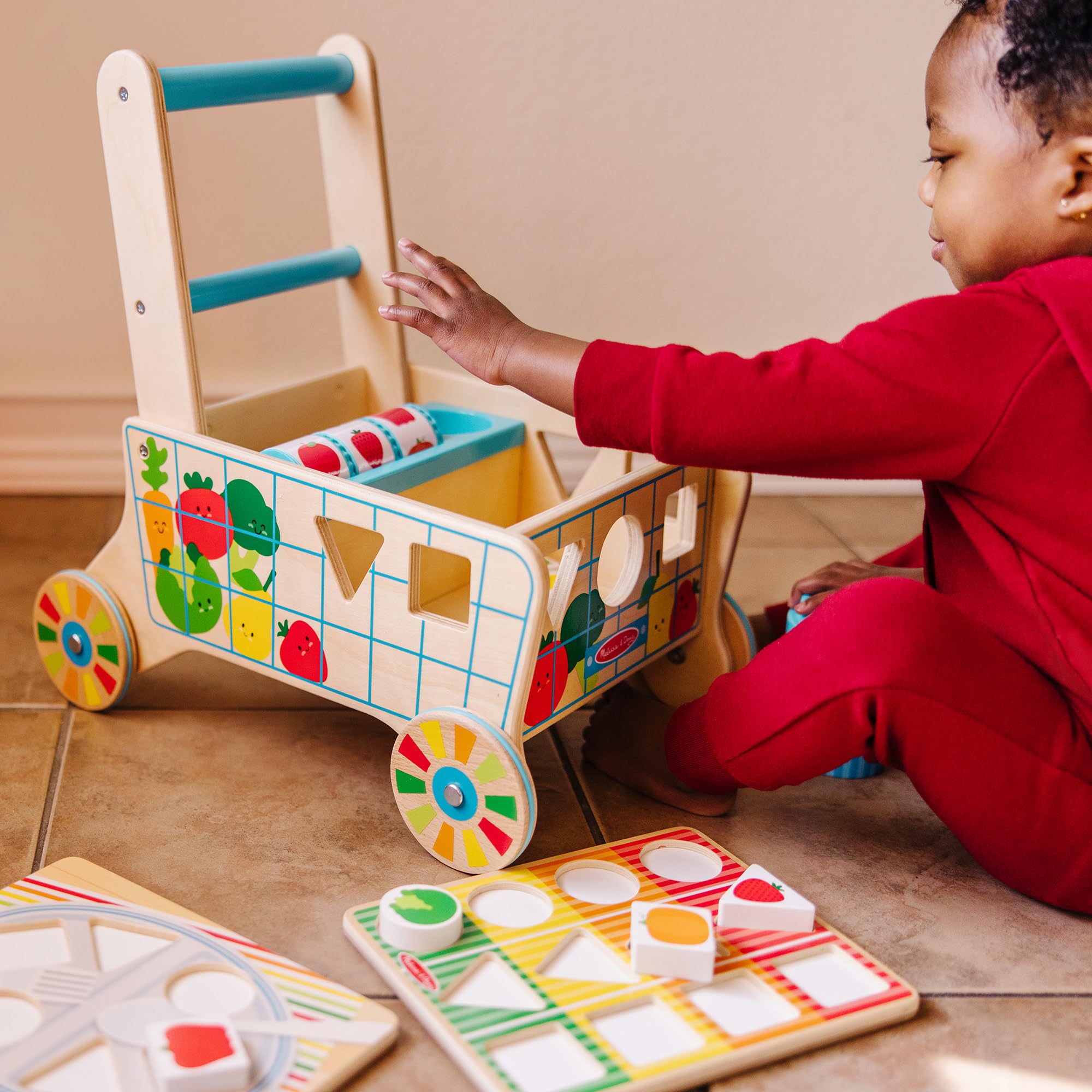 Melissa & Doug shape sorting pieces designed for little hands to explore colors and shapes.