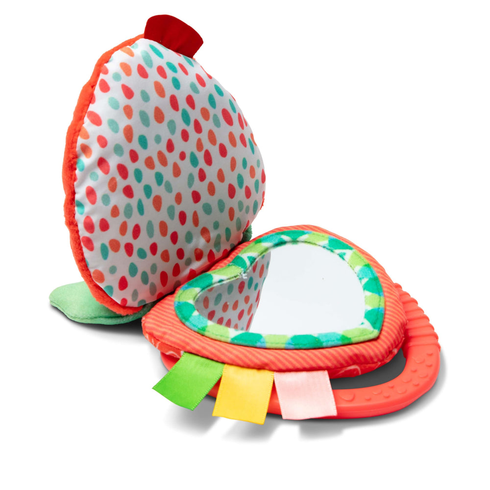 Melissa & Doug silicone teething ring provides soothing chew moments.