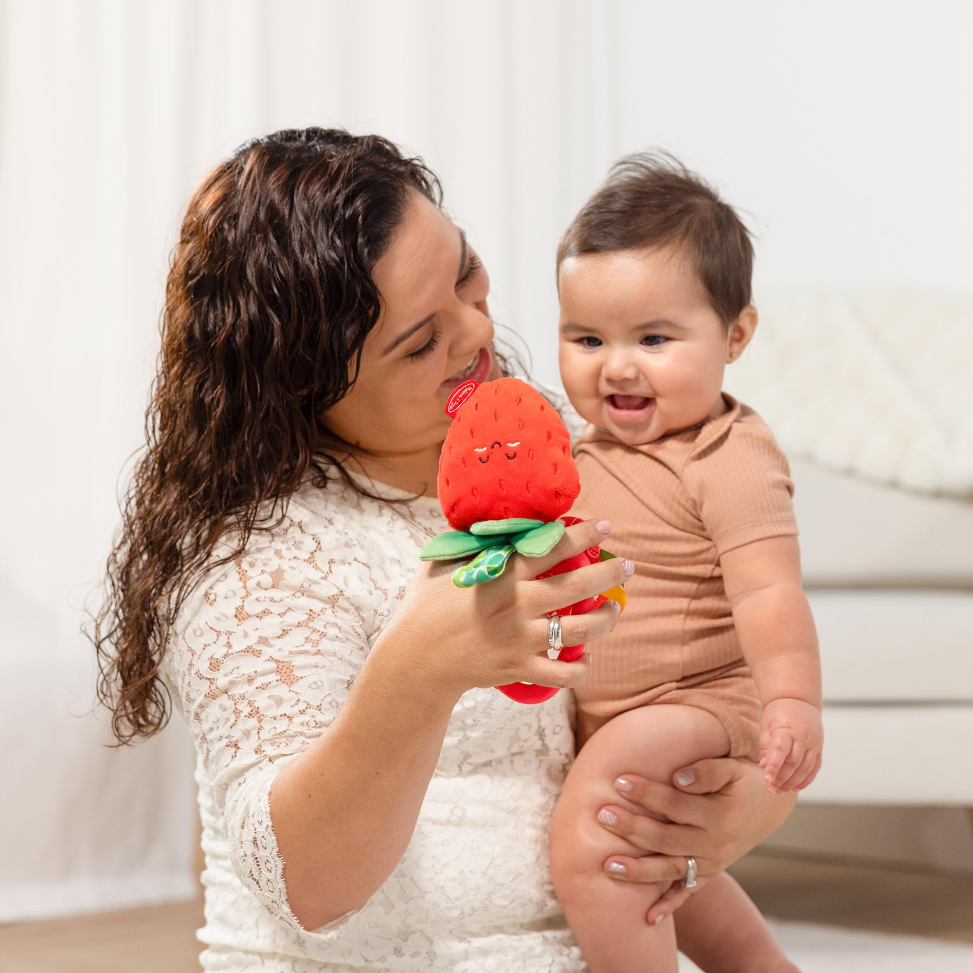 Melissa & Doug plush berry design for cuddly comfort.