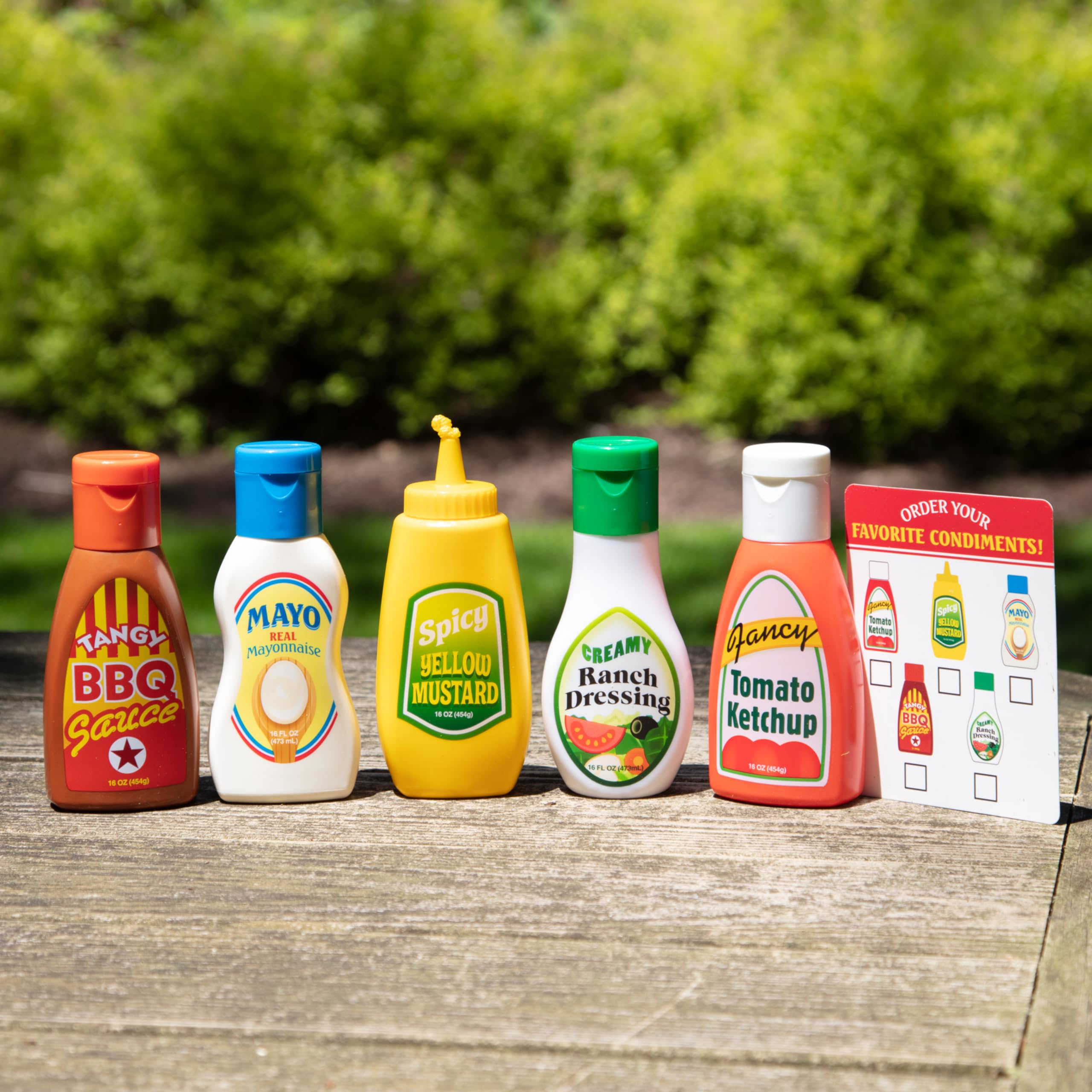 Melissa and Doug condiments set demonstrating interactive bottle tipping