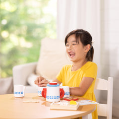 Placemat anchors the tea party scene for neat play