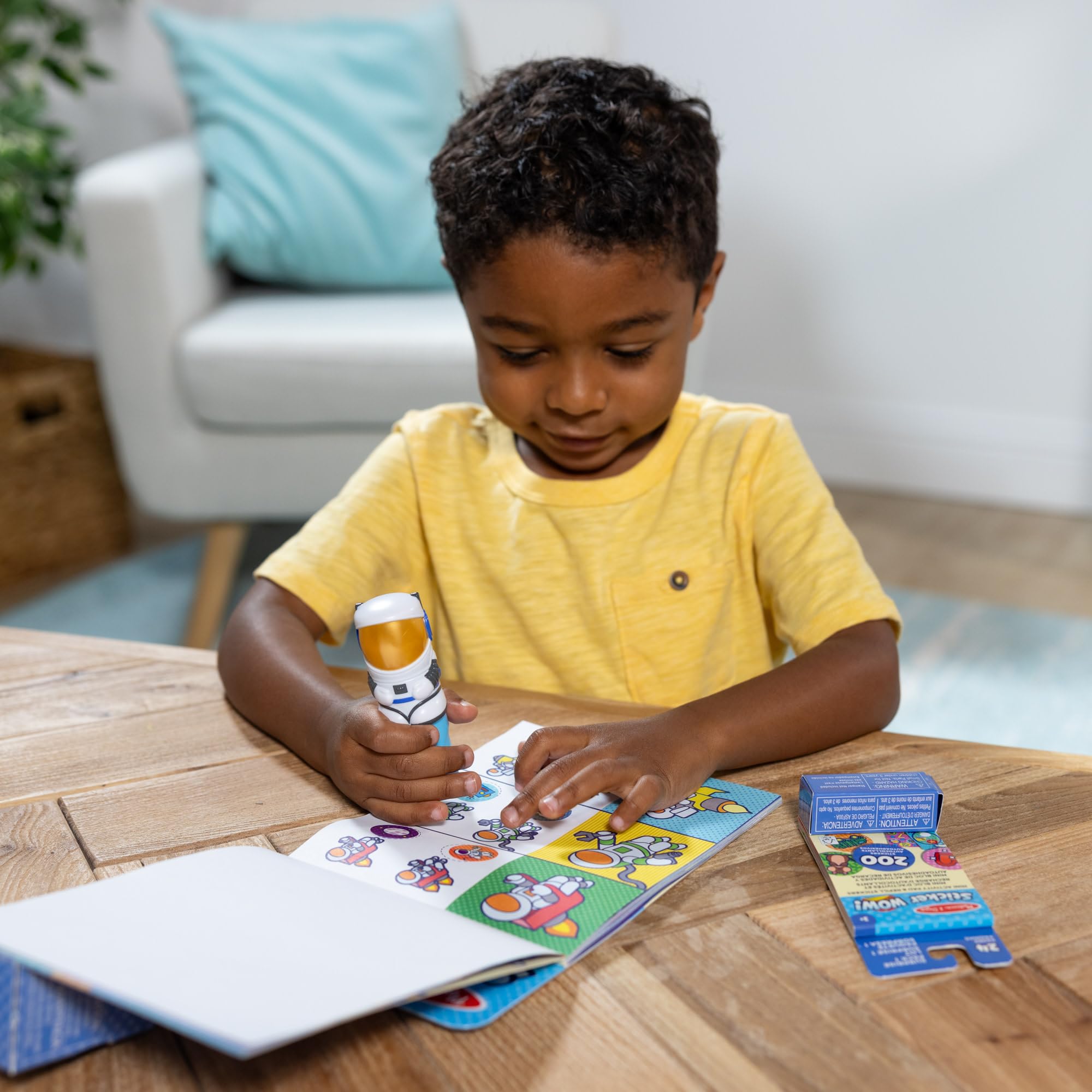 Melissa & Doug Sticker WOW Atlas the Astronaut encourages storytelling during play.