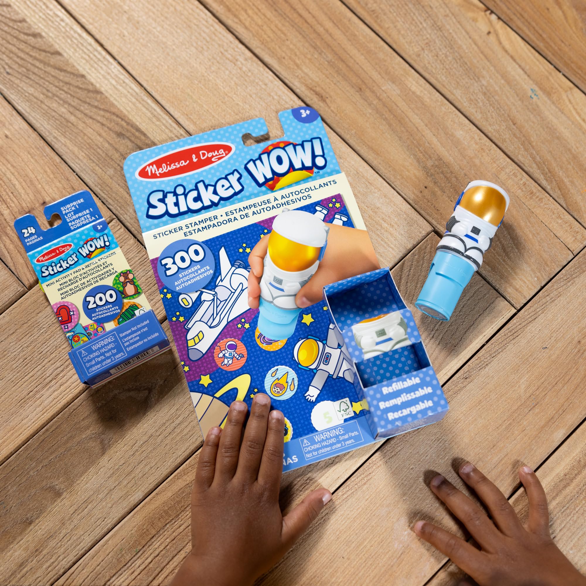 Melissa & Doug Sticker WOW stamper demonstrating mess-free sticker dispensing for on-the-go play.