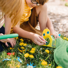 Carrying handle on Giddy Buggy Bug House enables park-ready portability