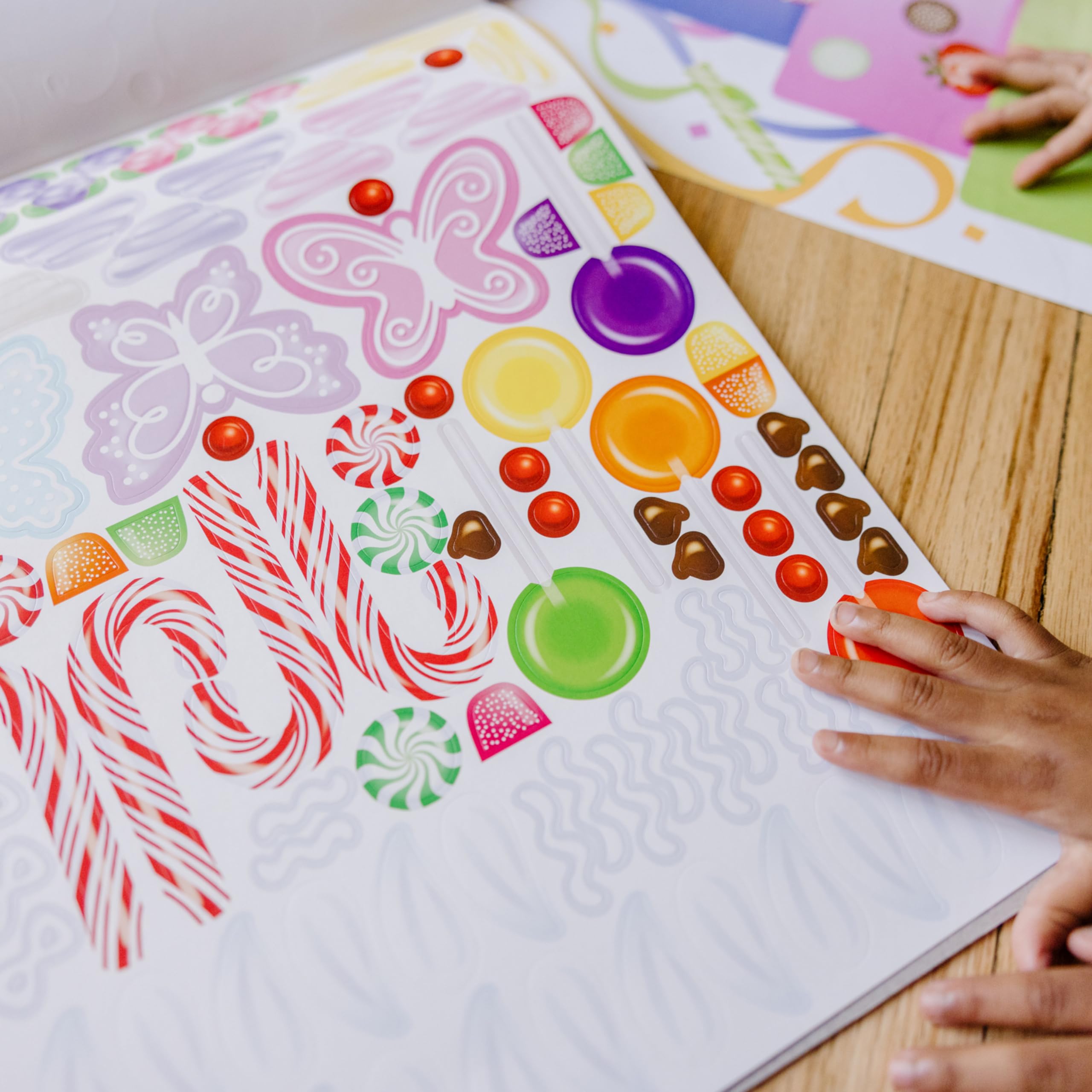 Sticker pad promotes fine motor skills and creative thinking during quiet play.