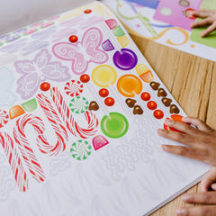 Sticker pad promotes fine motor skills and creative thinking during quiet play.
