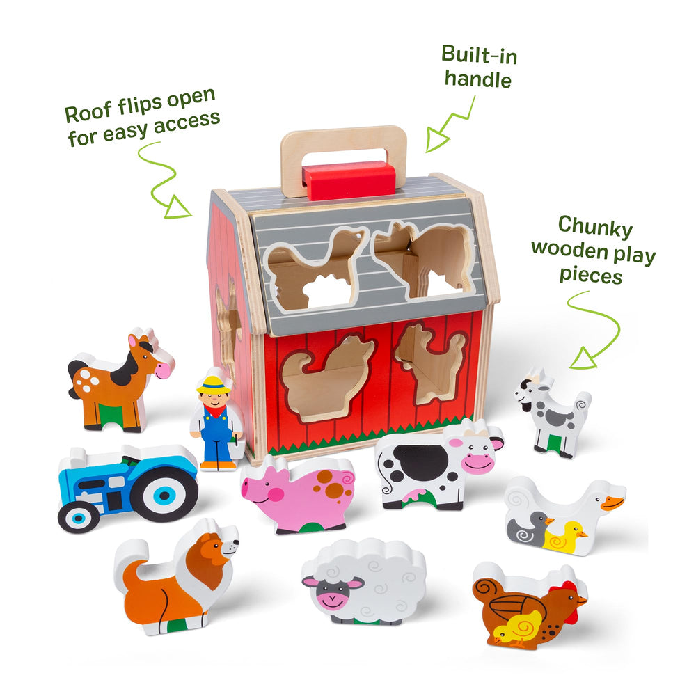 Melissa & Doug wooden farm animals fit into barn slots for sorting and imaginative storytelling