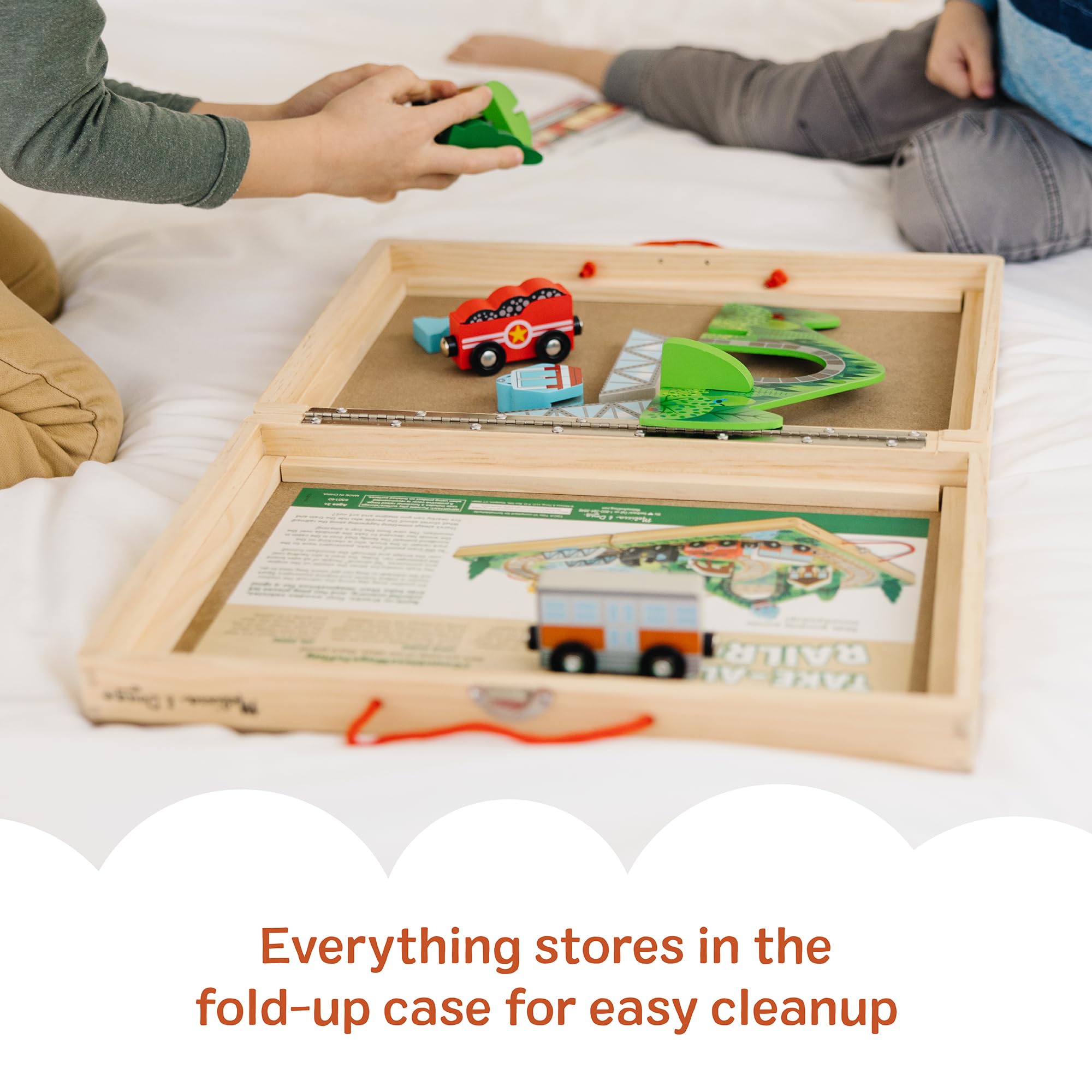 Melissa & Doug Take-Along Railroad ranger truck and animals spark role-play stories.