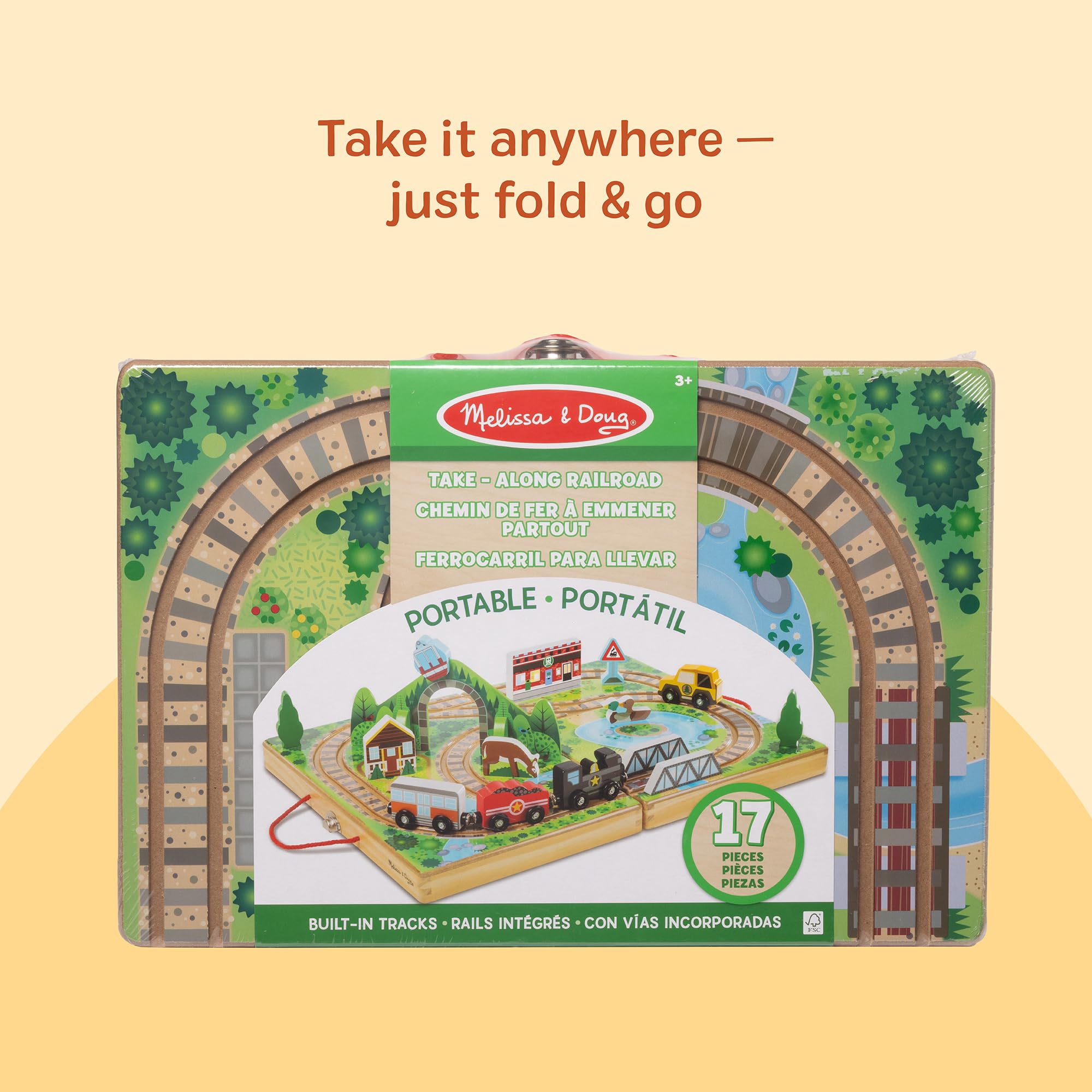 Melissa & Doug Take-Along Railroad includes toy storage for on-the-go organization.