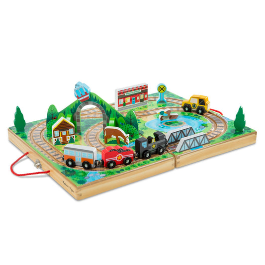 Melissa & Doug Take-Along Railroad case opened with colorful tracks for portable play.