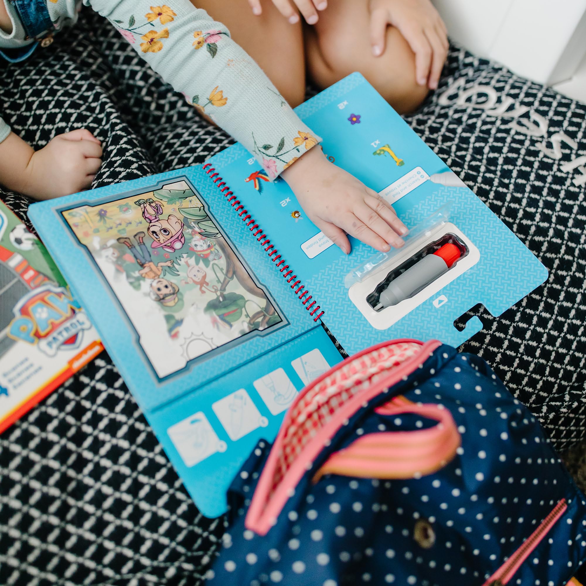 Melissa & Doug Water Wow travel pad with a compact spiral-bound design.