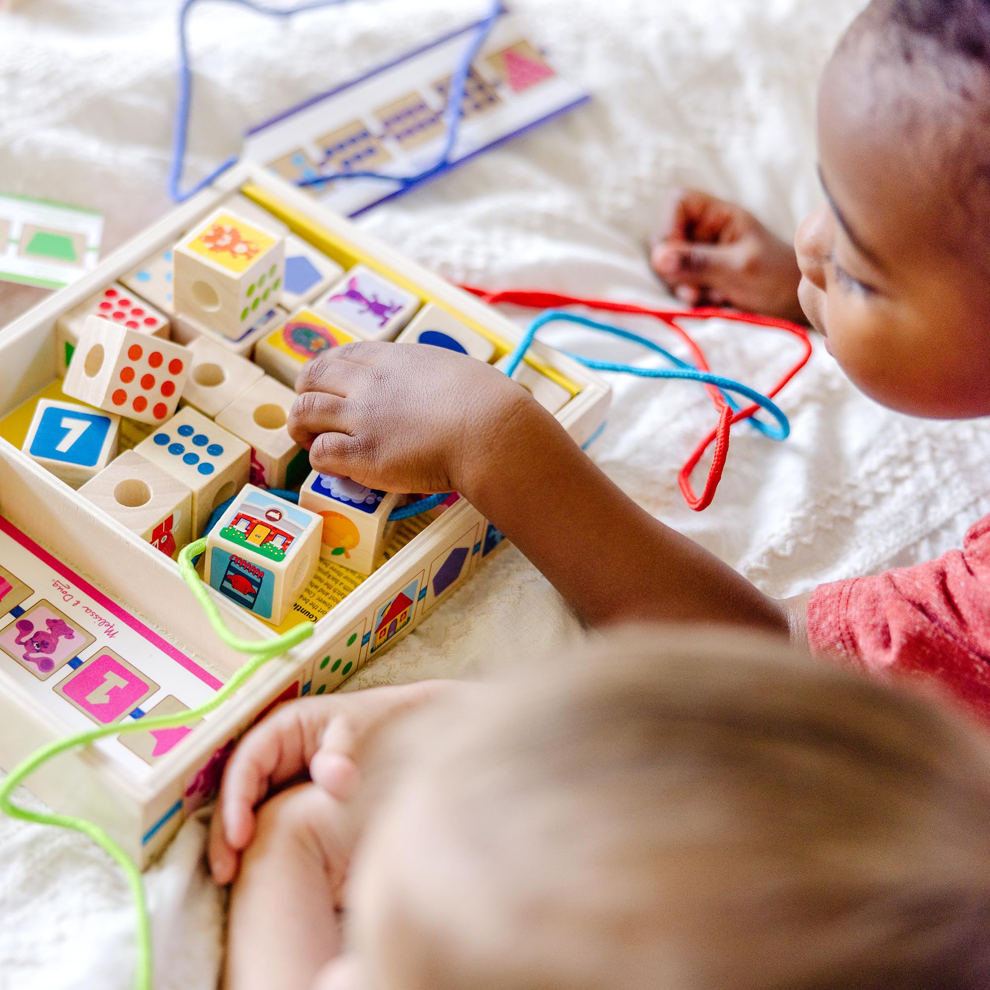 Melissa & Doug beads and pattern cards aid color and shape recognition