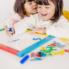 Melissa & Doug wooden frame with handle makes portable creativity on the go.