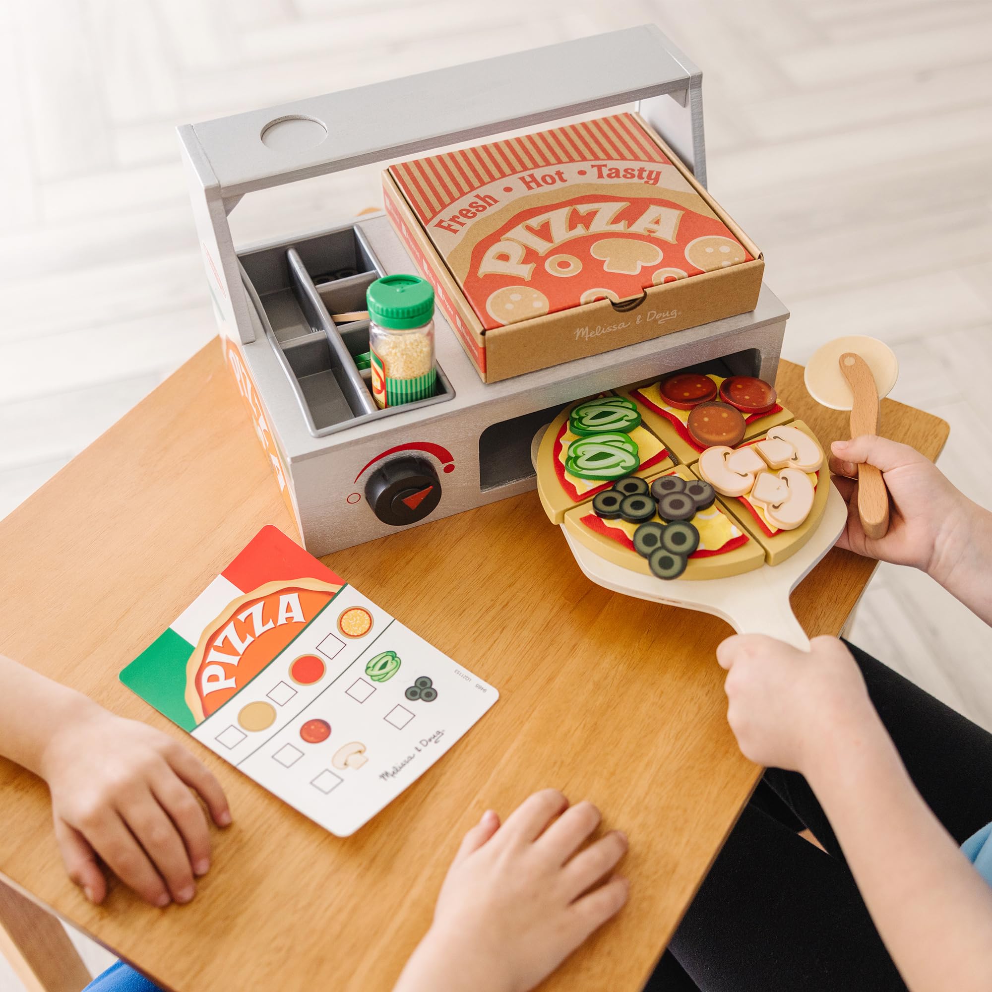 Wooden pizza crust on the counter for hands-on crafting