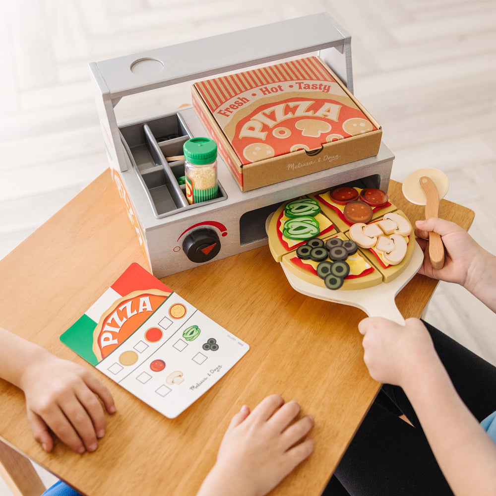 Wooden pizza crust on the counter for hands-on crafting