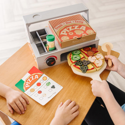 Wooden pizza crust on the counter for hands-on crafting