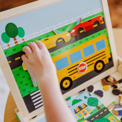 Melissa & Doug wooden storage case keeps magnets organized.