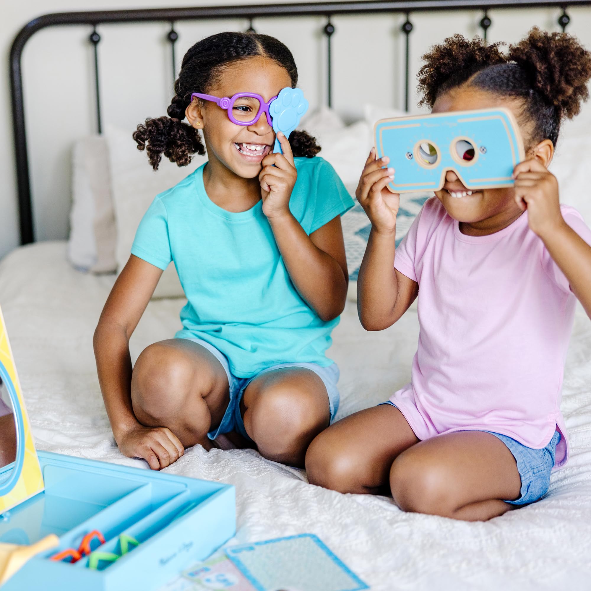 Melissa & Doug wooden tray with removable lid helps organize play space.