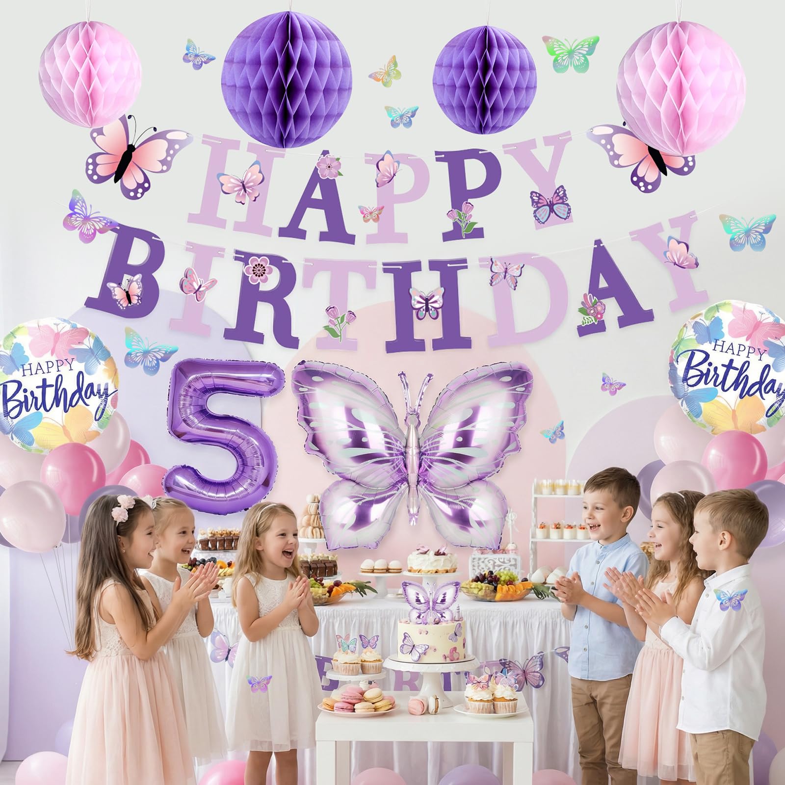 Melody Fantasy butterfly garden wall decor creates an enchanting birthday setting.