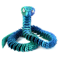 Memogizz snake egg rotates on the desk for interactive Easter gift vibes.