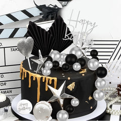 MEMOVAN black round birthday topper provides a clean finishing touch