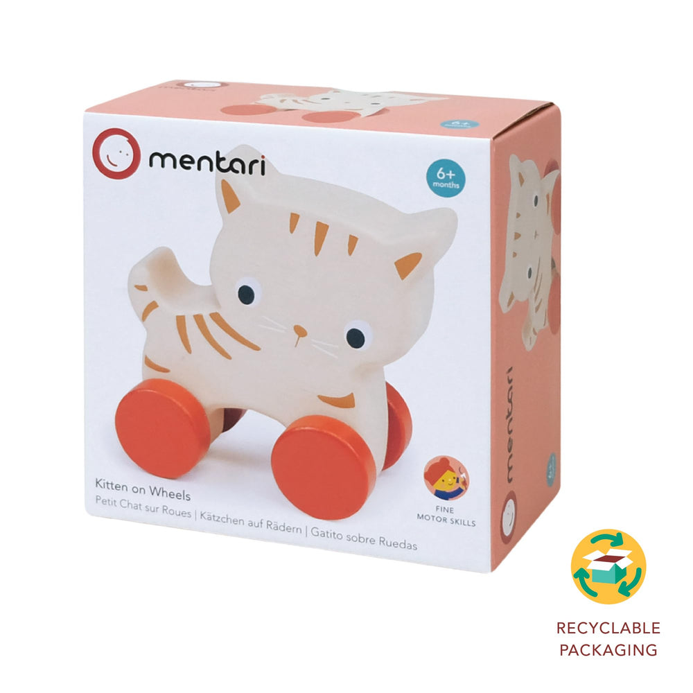Mentari Kitten on Wheels rolling action on wooden floor demonstrates motor skill support.