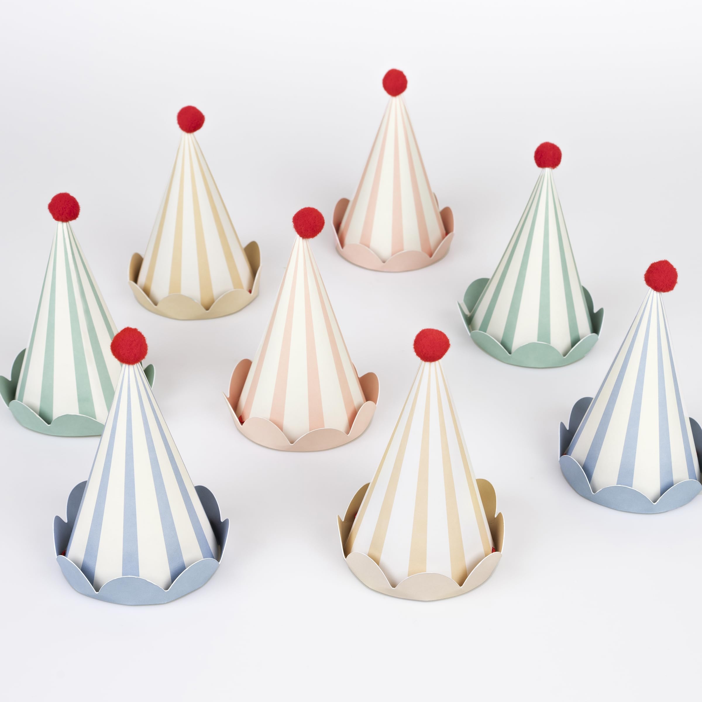 Meri Meri birthday hats with eight colorful cone designs, ideal for festive photos.