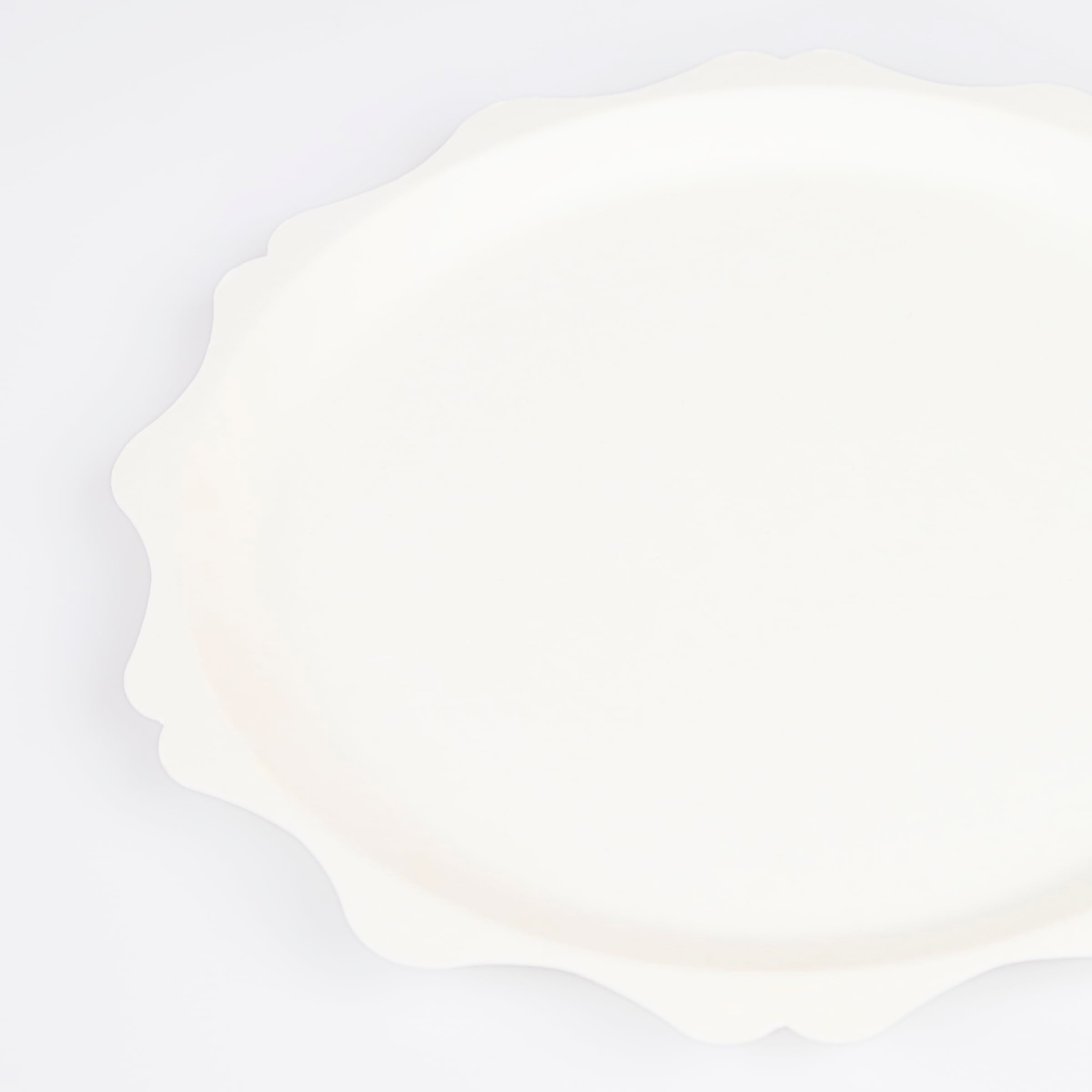 Meri Meri elegant-edge cream plates ideal for baby showers and celebrations.