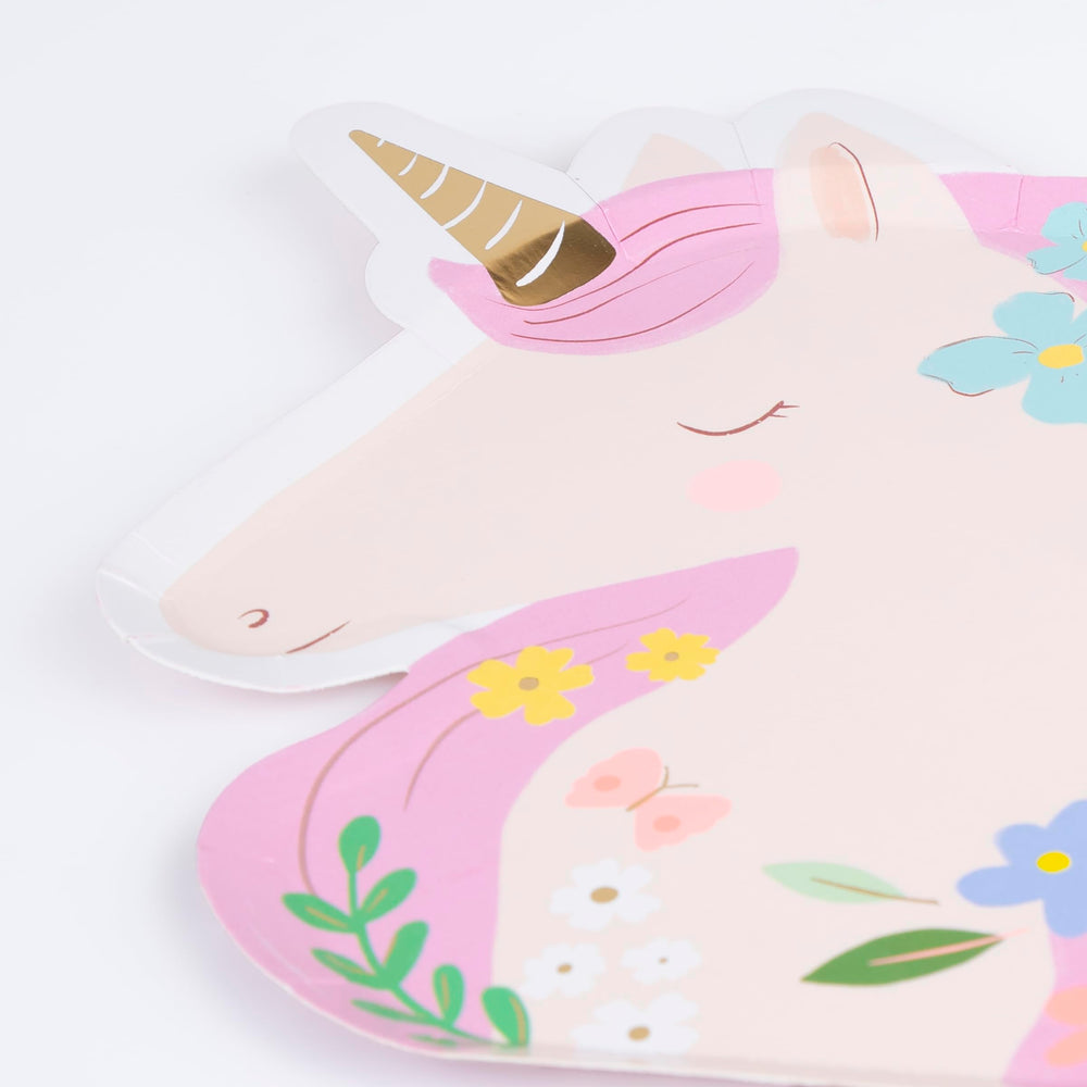 Meri Meri Meadow Unicorns plates arranged in a pastel, whimsical tablescape for celebrations.