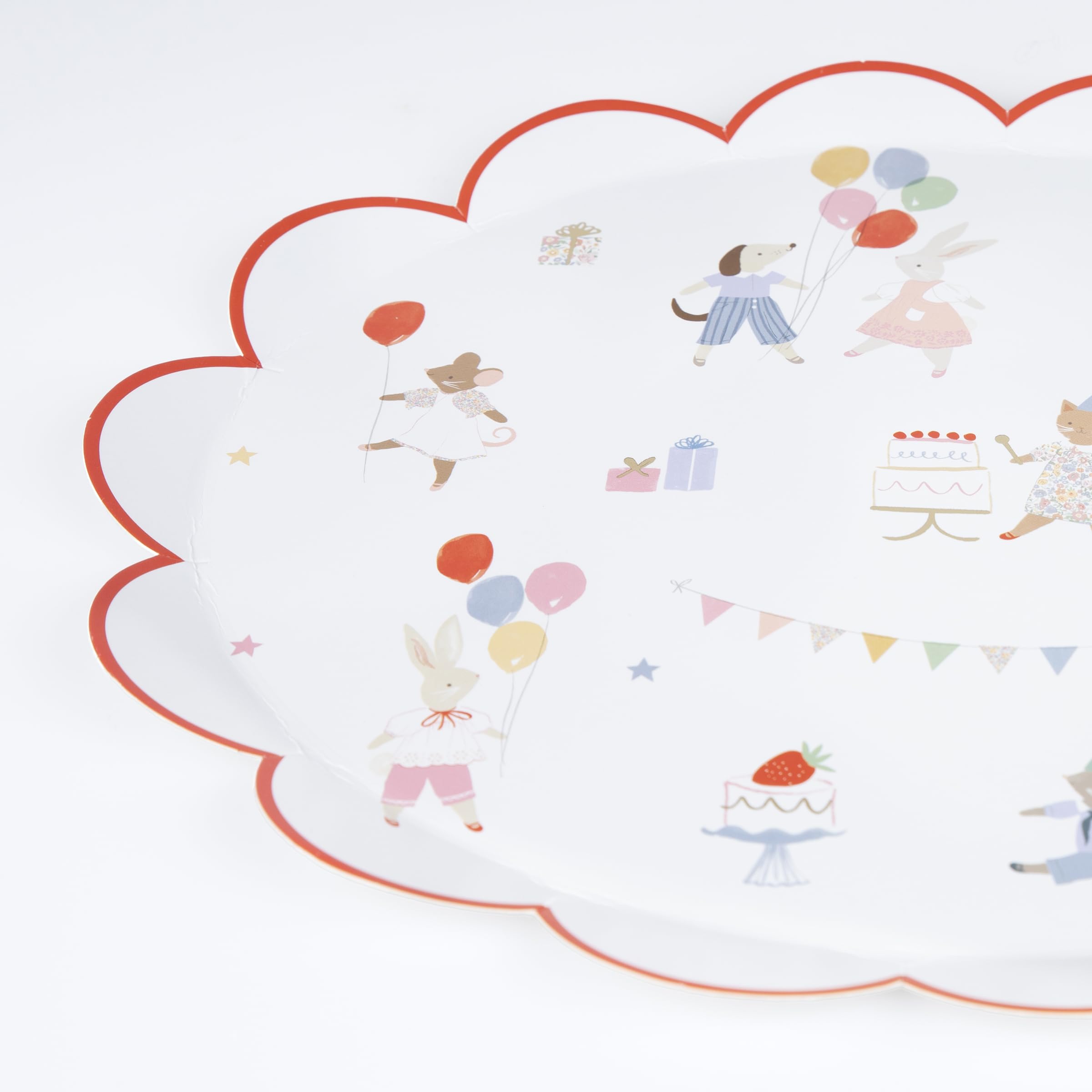 Meri Meri Animal Friends plates feature pastel animal illustrations for festive celebration tables.