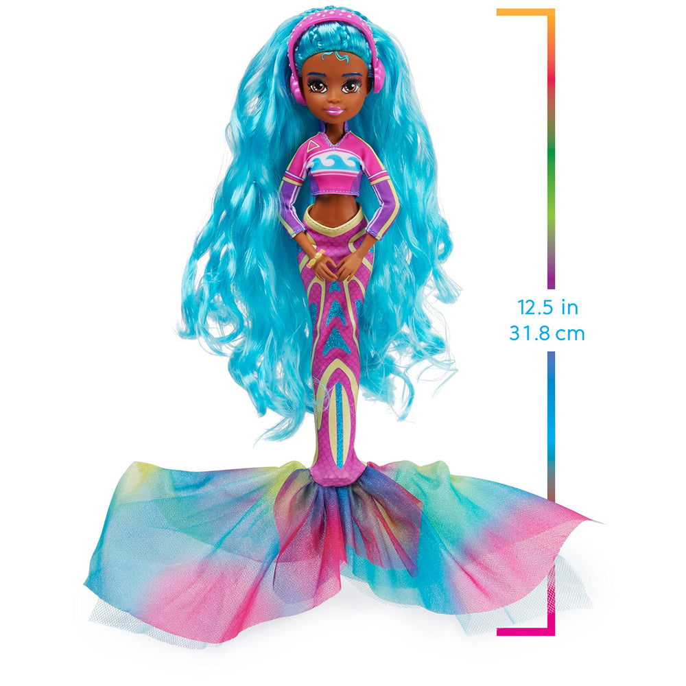 MERMAID HIGH seashell laptop doubles as a pretend tech prop.