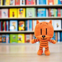 Close-up on MerryMakers Li'l Petey plush with embroidered stripes and a friendly smile.