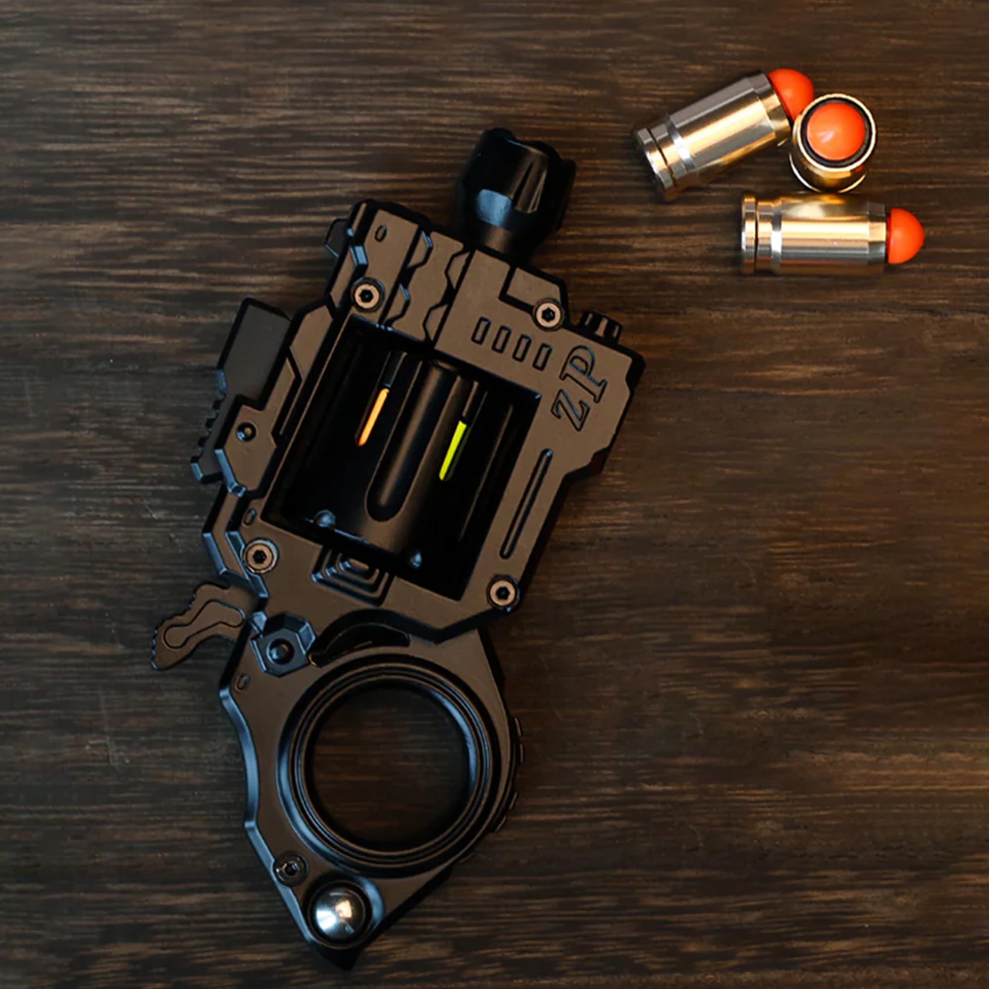 Metal Fidget Gun clicker providing rhythmic feedback during work.