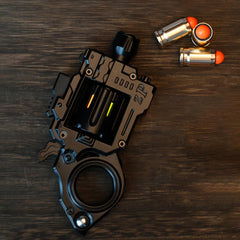 Metal Fidget Gun clicker providing rhythmic feedback during work.