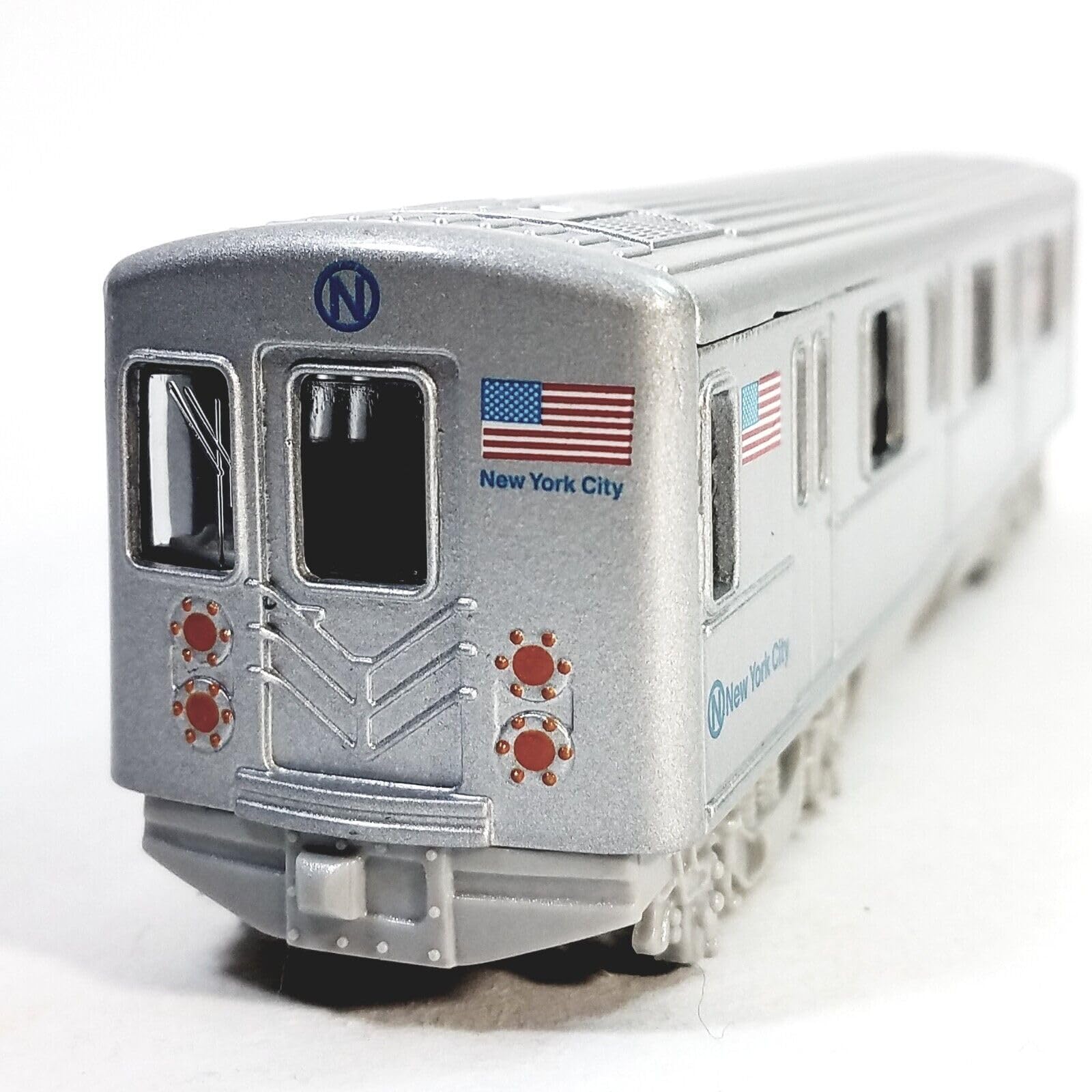 METRO diecast subway train wheels and chassis reveal sturdy construction.