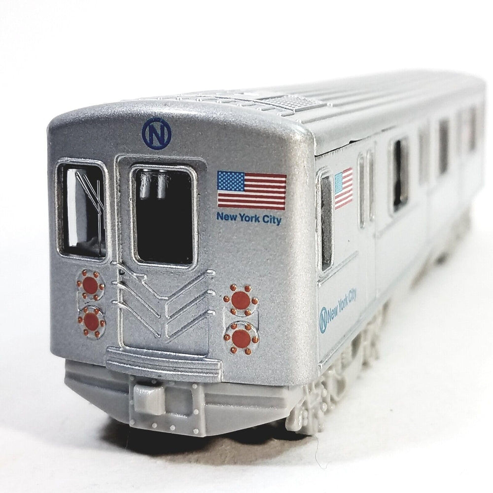 METRO diecast subway train wheels and chassis reveal sturdy construction.