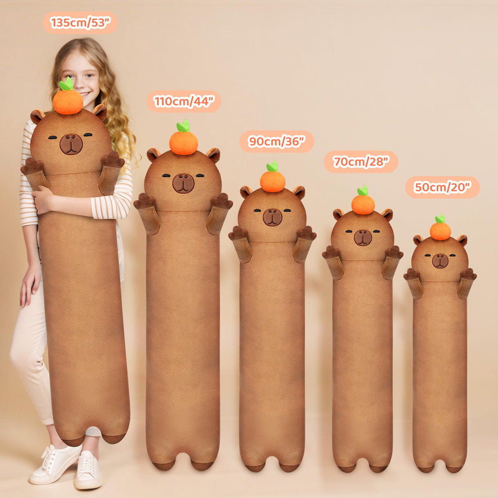Mewaii long capybara plush 90cm provides full-body snuggle on sofa.