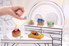 MGA's Miniverse bunny with cozy log enclosure invites snug habitat design.