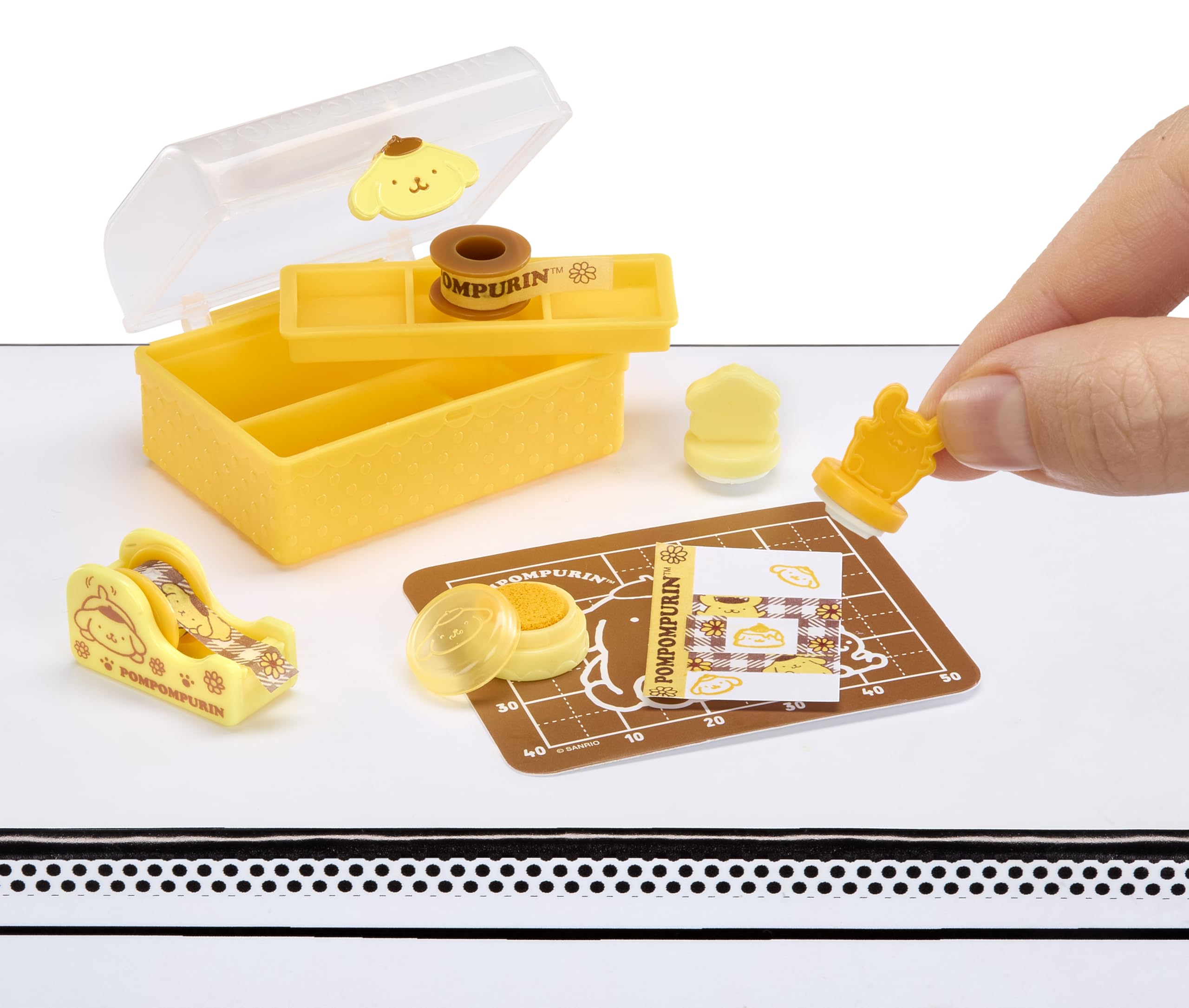 Kuromi-shaped erasers add playful detail to mini stationery collection.