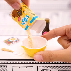 MGA's Miniverse Make It Mini recipe card and tiny ingredients for scratch desserts