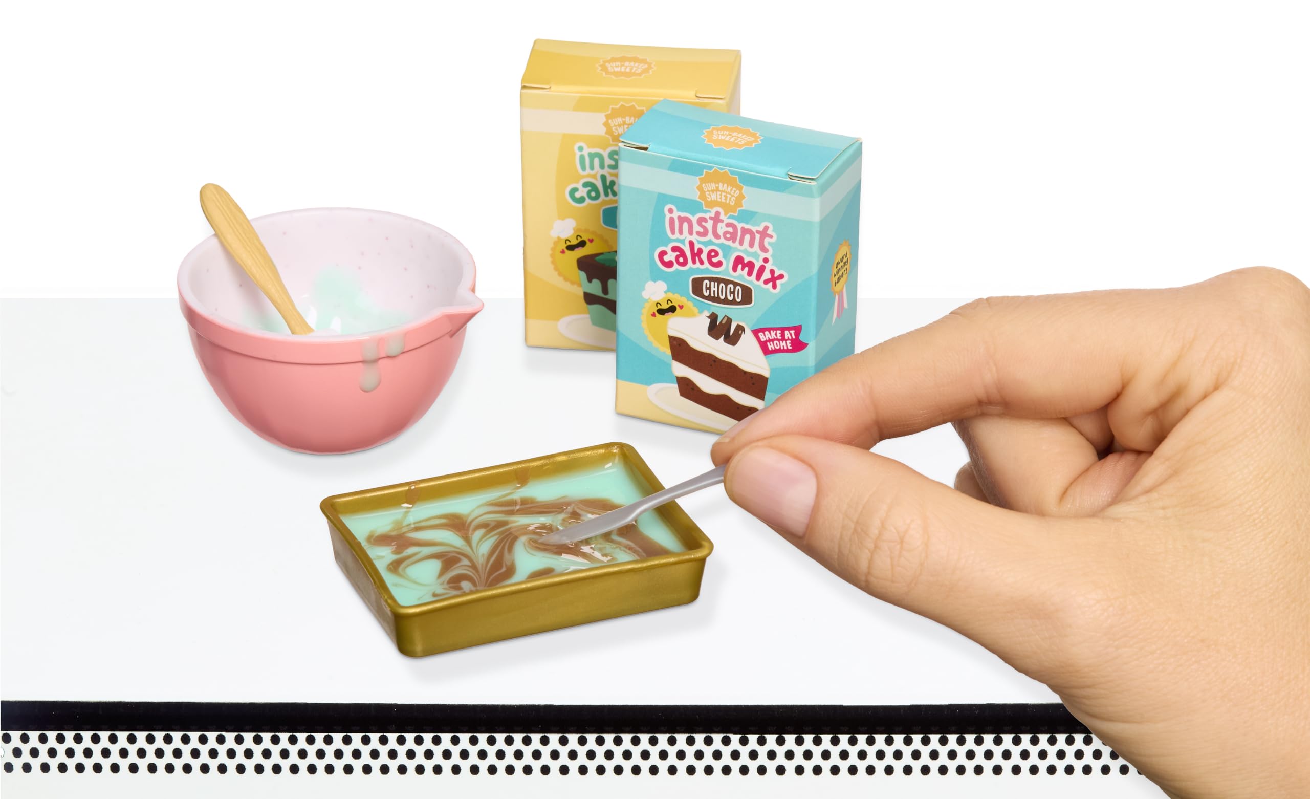 MGA's Miniverse Make It Mini mixing bowl and rolling pin for crafting tiny treats.