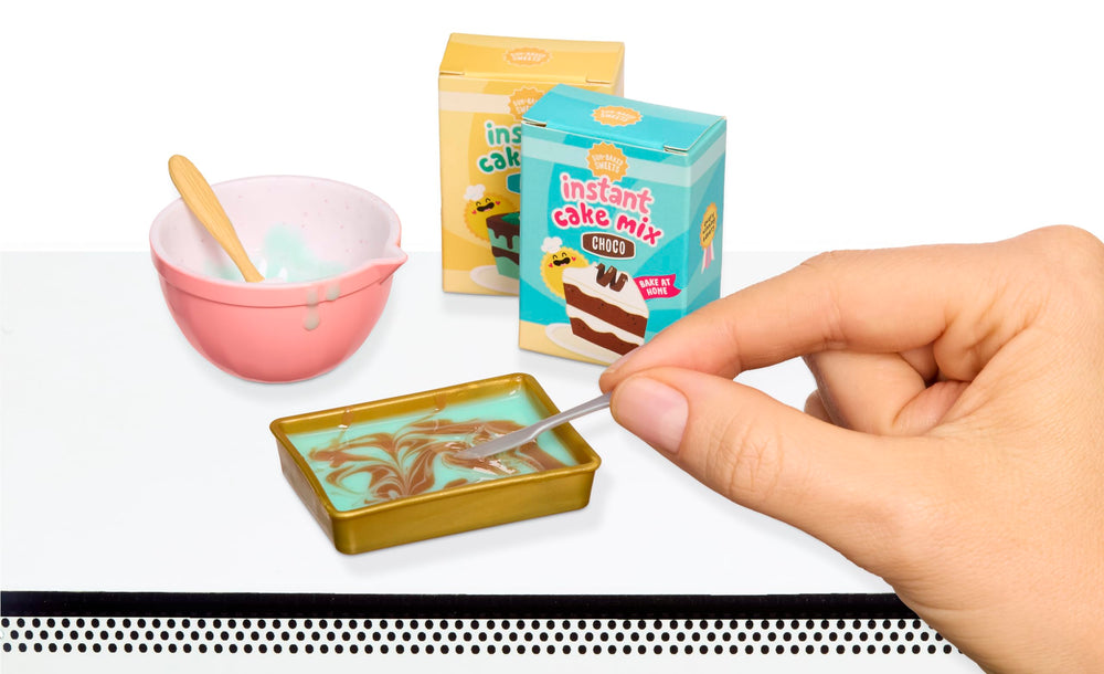 MGA's Miniverse Make It Mini mixing bowl and rolling pin for crafting tiny treats.