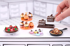 Mini Reese's cups replica offers collectible charm for shelving.