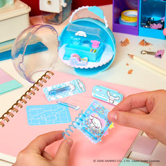 Eight collectible mini stationery sets encourage slow reveals and playful shelf-worthy displays.