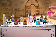 The display-ready potion ball transforms into a bottle for showcasing minis